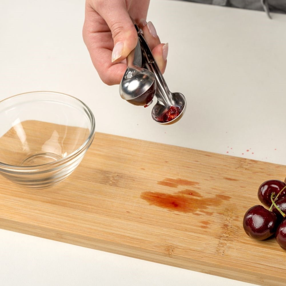 Core remover in stainless steel for cherries and olives