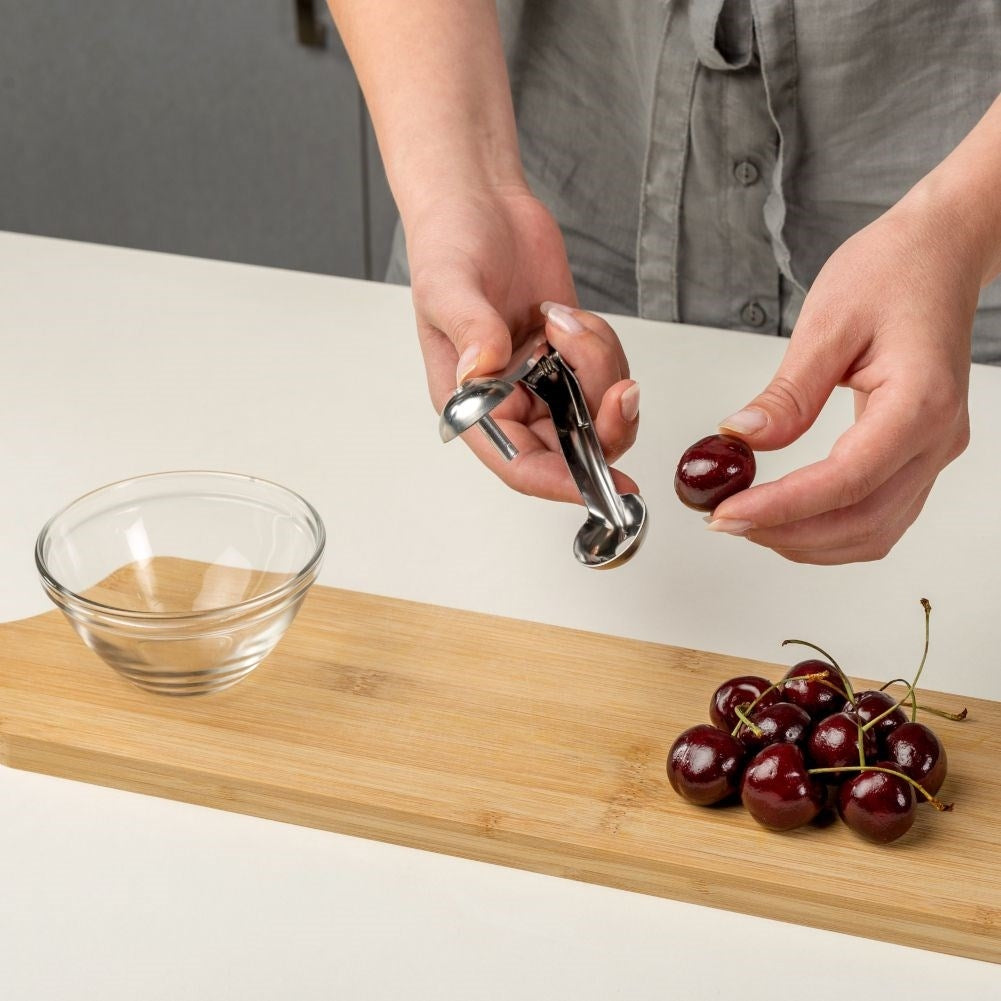 Core remover in stainless steel for cherries and olives