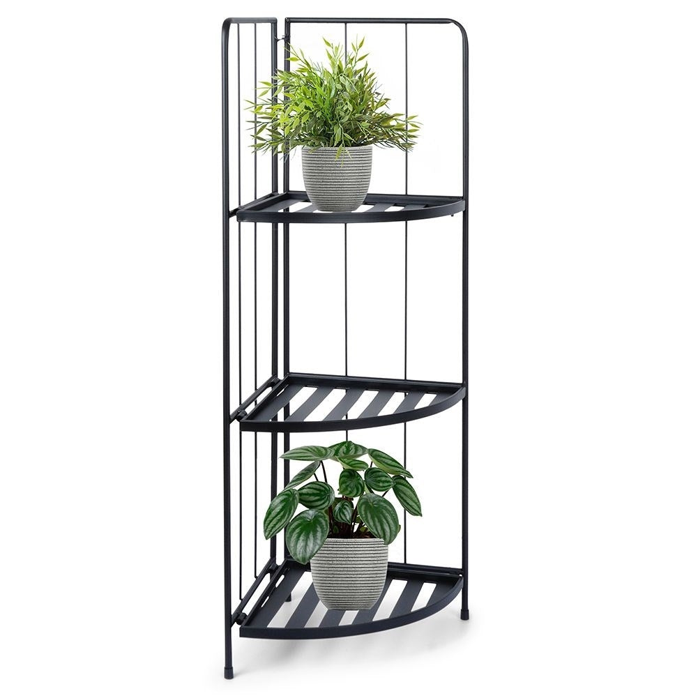 Corner shelf in black metal for flowers and herbs