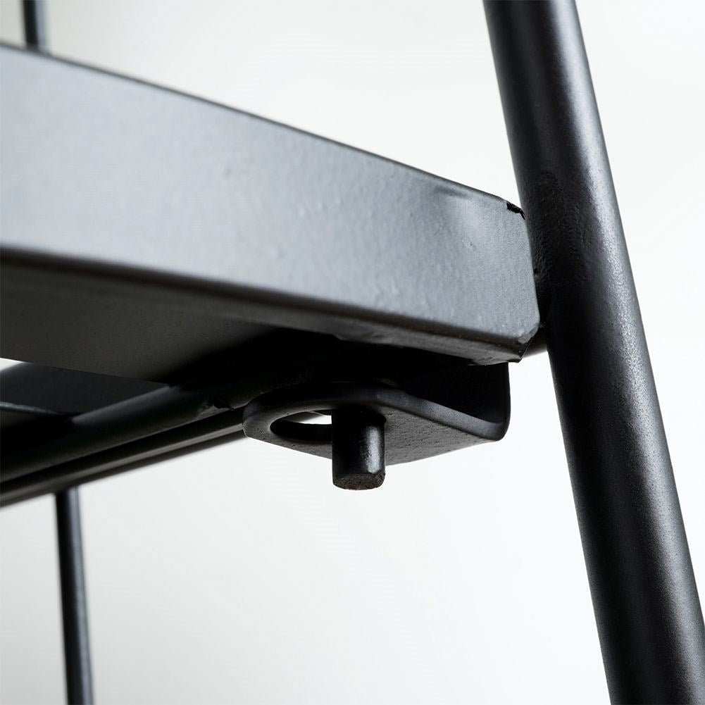 Corner shelf in black metal for flowers and herbs