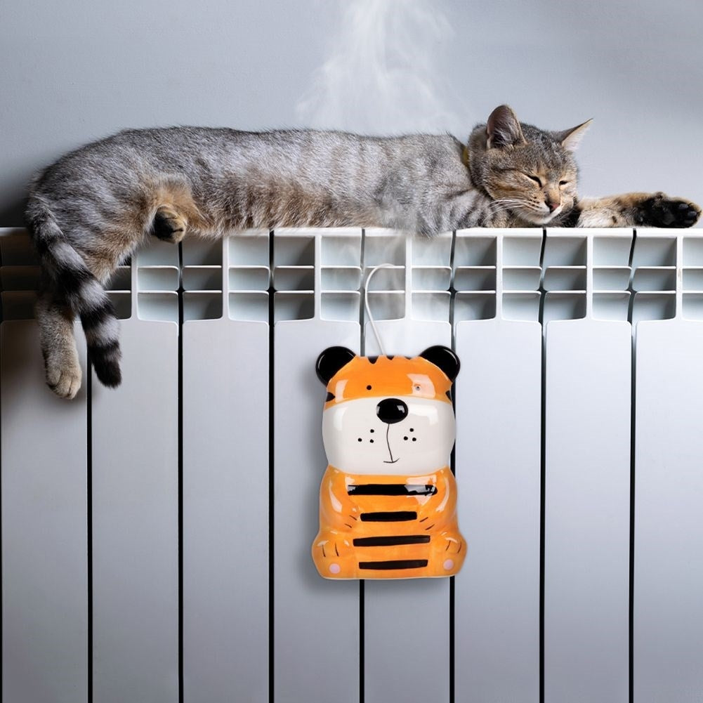 Cute tiger ceramic humidifier for children's rooms, hangs on elements