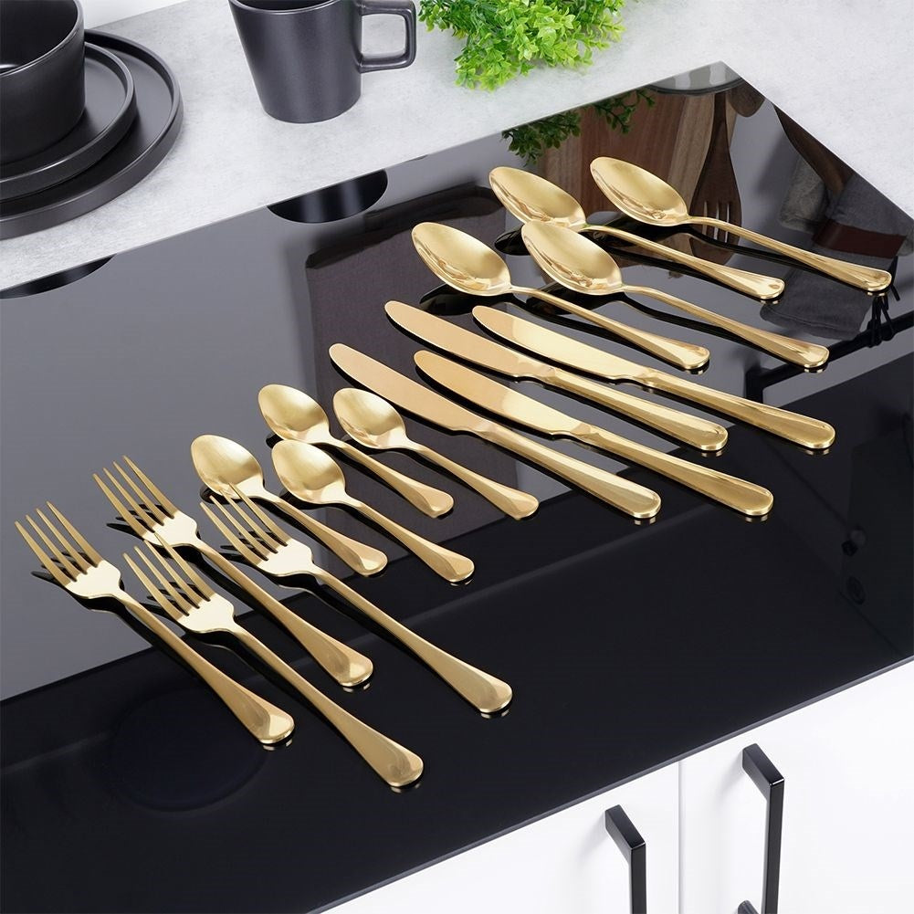 Cutlery set for 4 in shiny, golden stainless steel