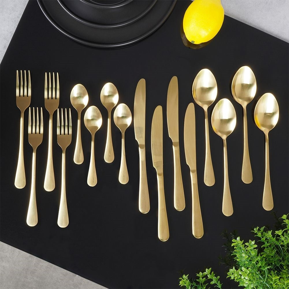Cutlery set for 4 in shiny, golden stainless steel