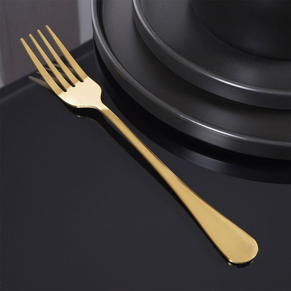 Cutlery set for 4 in shiny, golden stainless steel