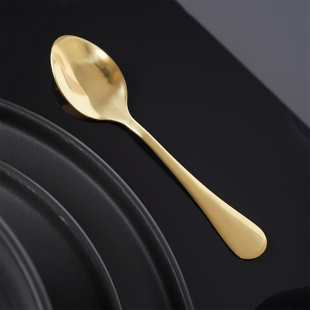 Cutlery set for 4 in shiny, golden stainless steel