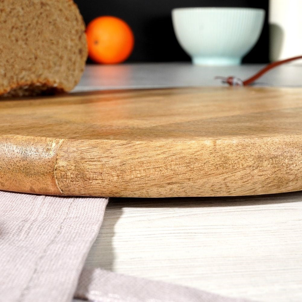 Cutting and serving board in durable mango wood
