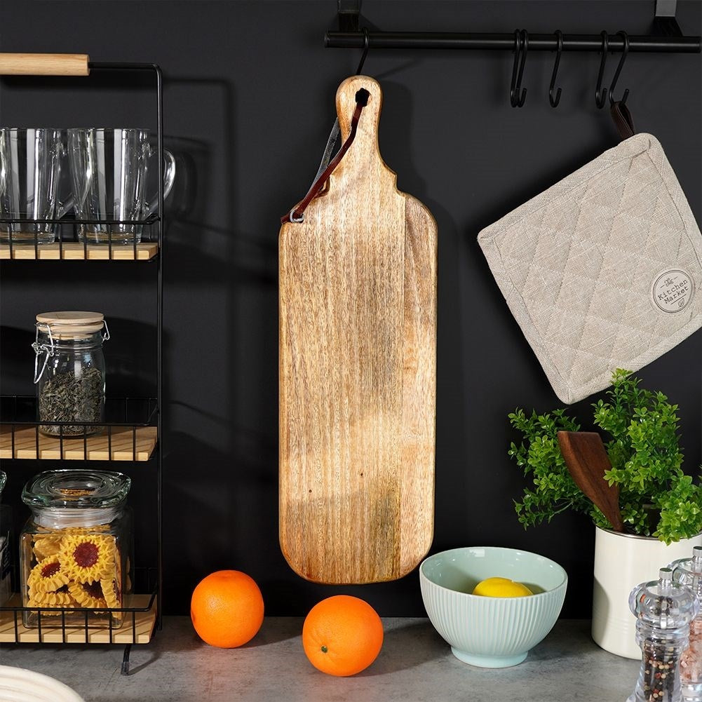 Cutting board and serving tray in mango wood with handle