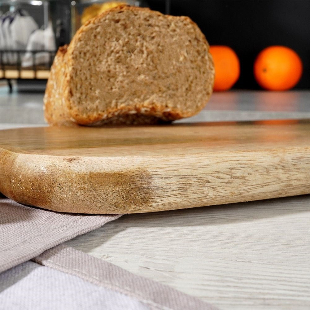 Cutting board and serving tray in mango wood with handle