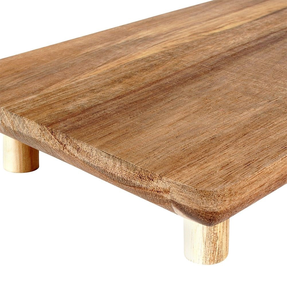 Cutting board in durable acacia wood with four legs