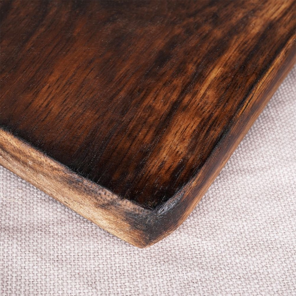 Cutting board in durable mango wood with handle