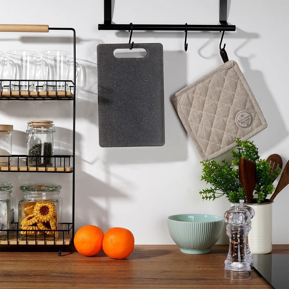 Cutting board in granite design with handle, odor and liquid resistant