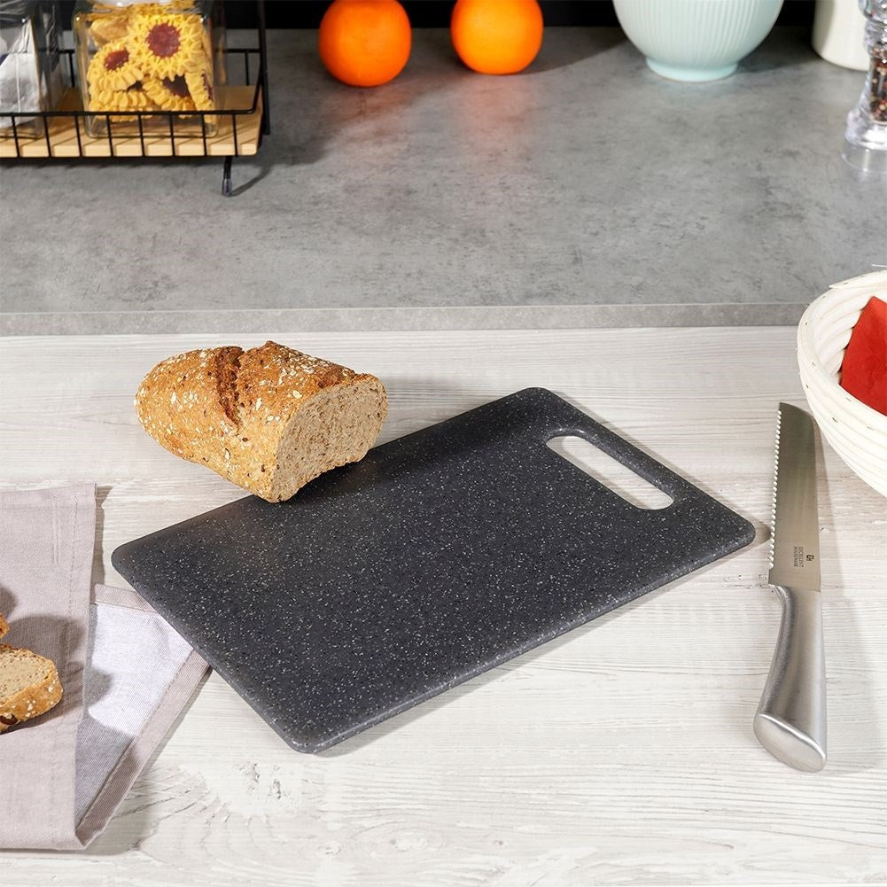 Cutting board in granite design with handle, odor and liquid resistant