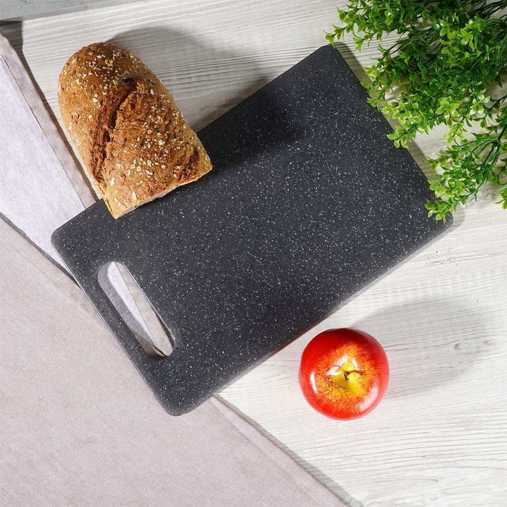 Cutting board in granite design with handle, odor and liquid resistant