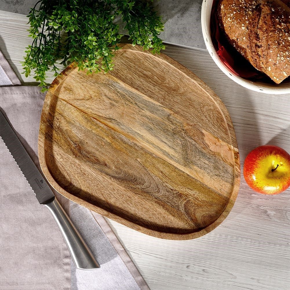 Cutting board in mango wood with a high edge and felt cushions