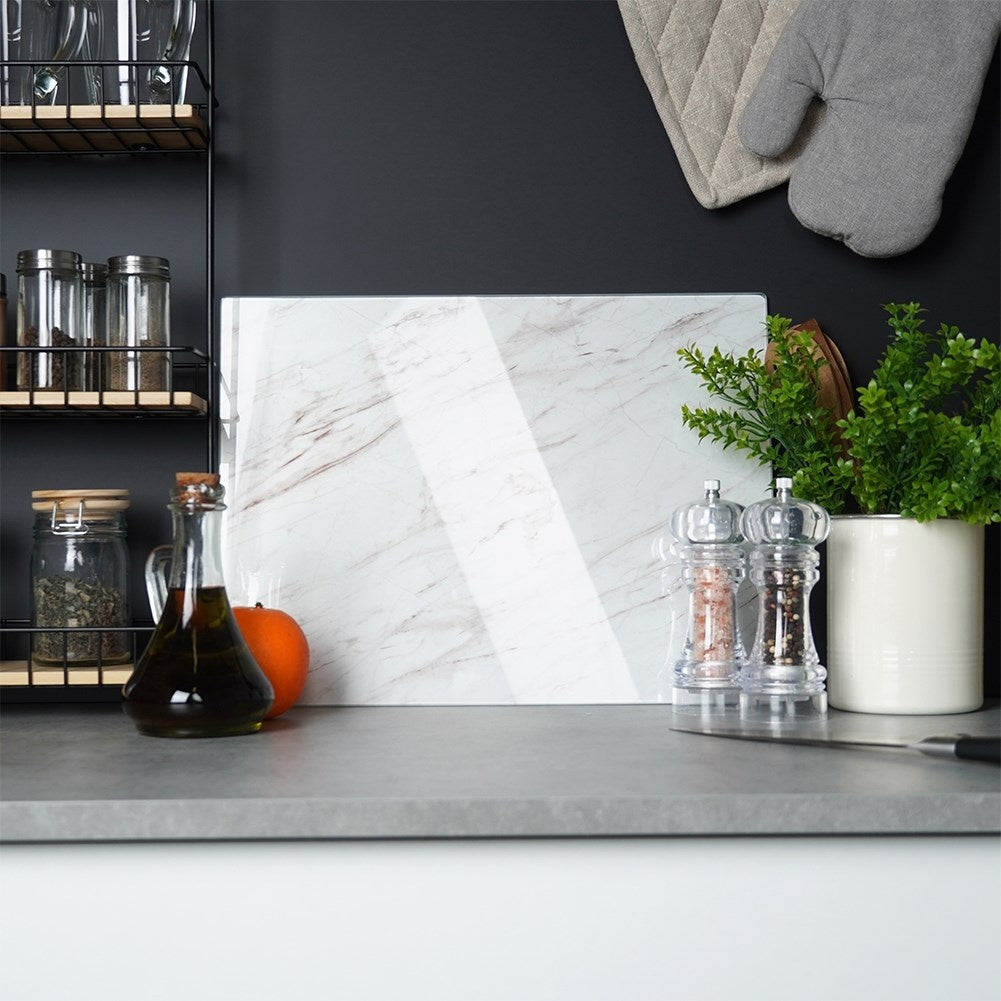 Cutting board in tempered glass with non-slip feet