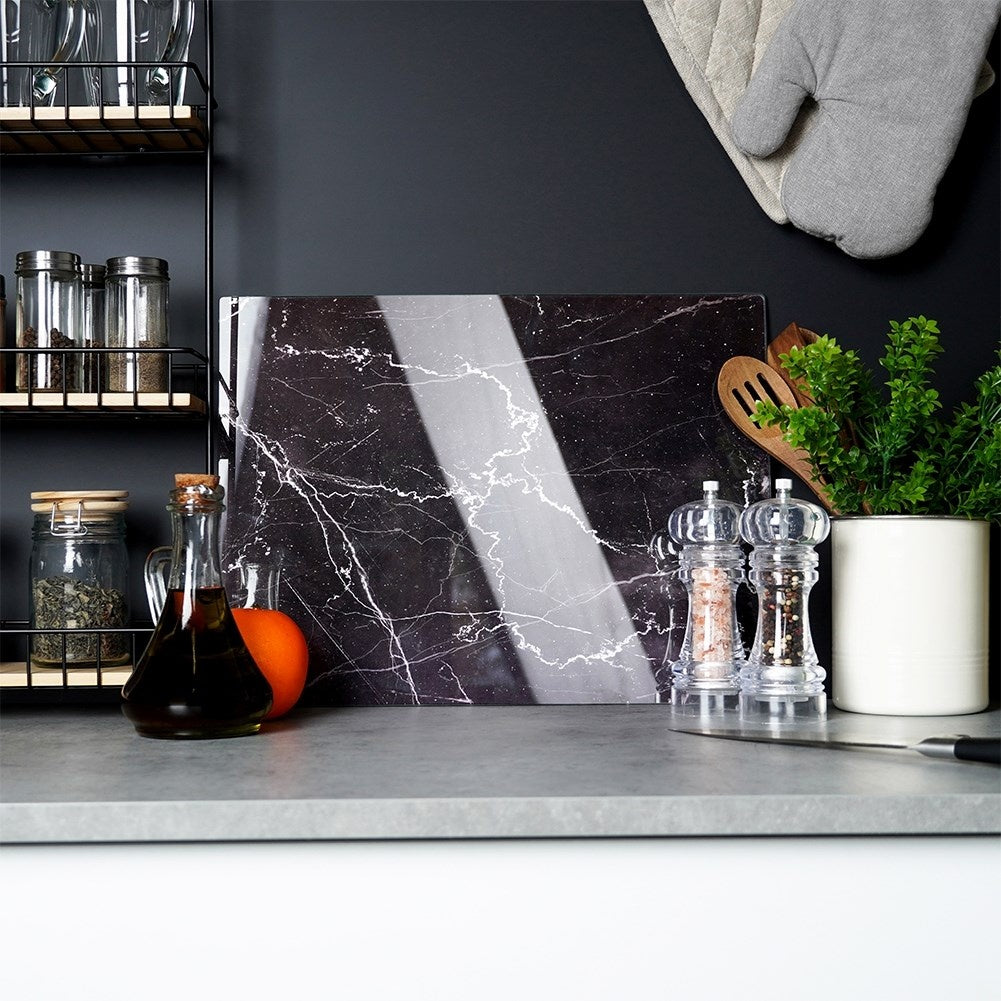 Cutting board in tempered glass with non-slip feet