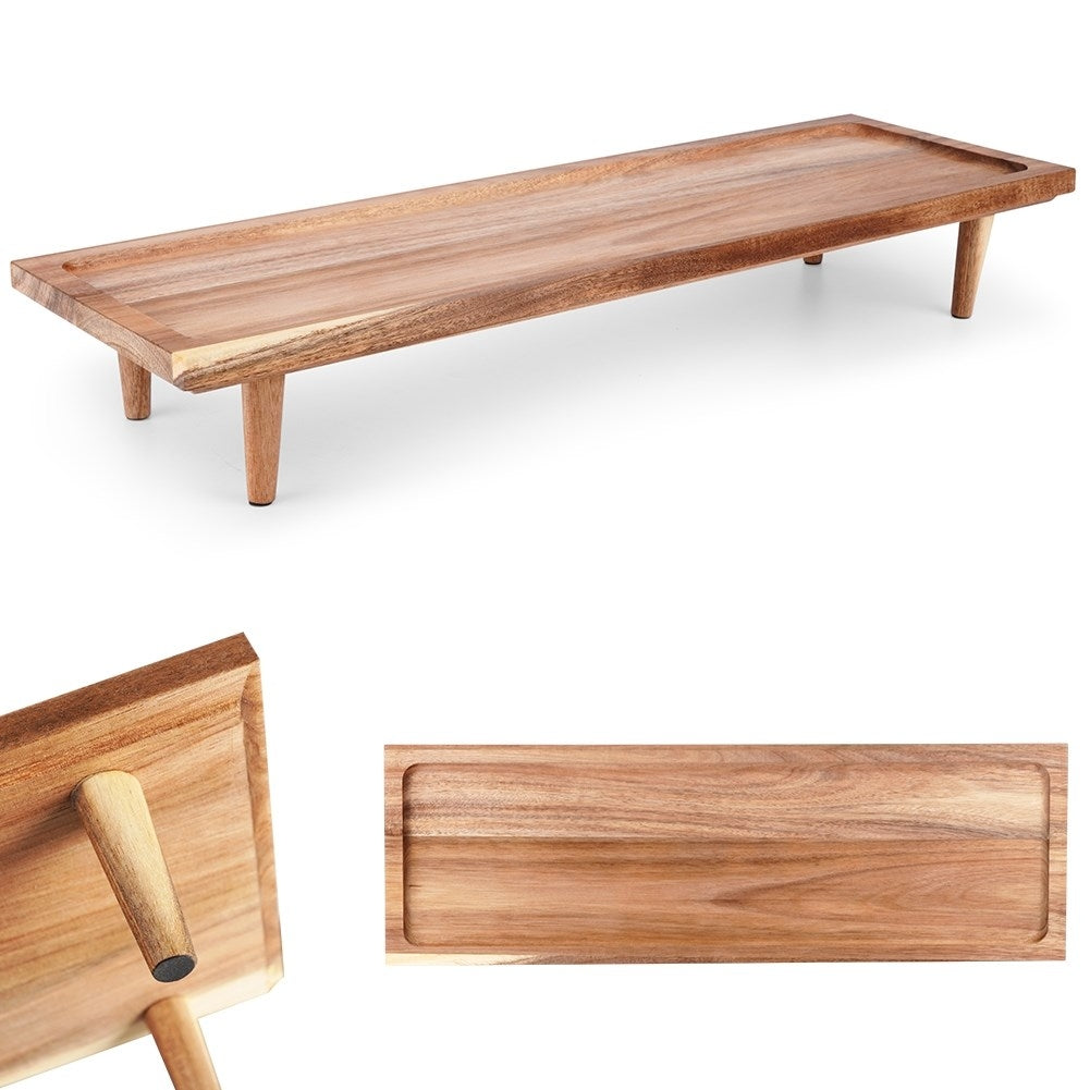 Cutting board made of acacia wood on high legs for serving