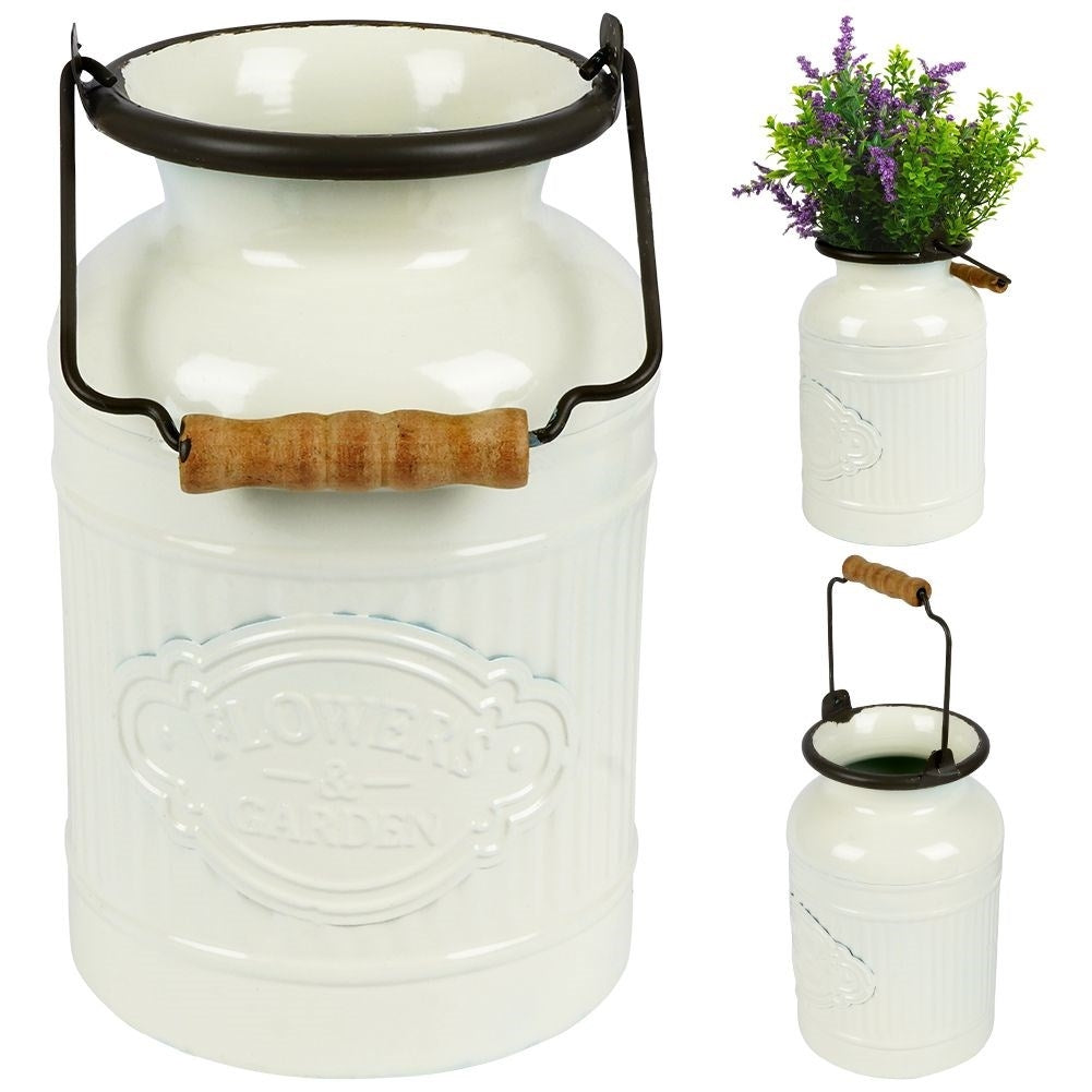 Decorative beige metal jug in retro style for home and garden