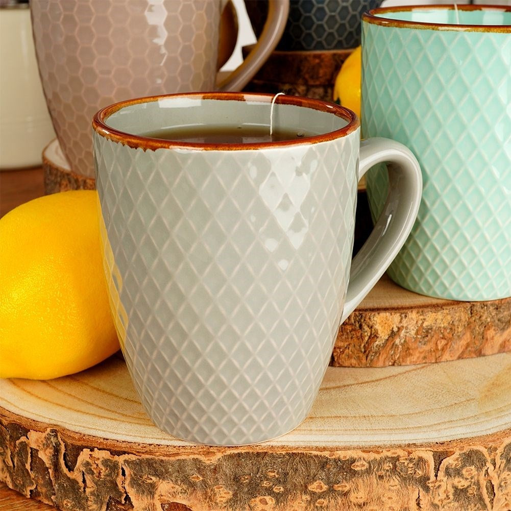Decorative ceramic cups in a gift box for drinks