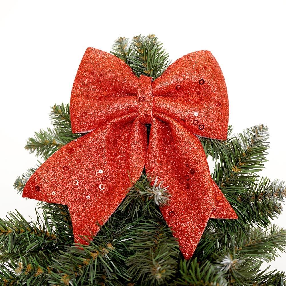 Decorative red bow with glitter and sequins for Christmas