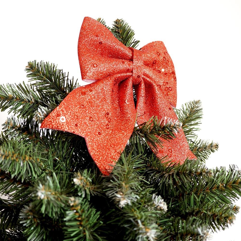 Decorative red bow with glitter and sequins for Christmas
