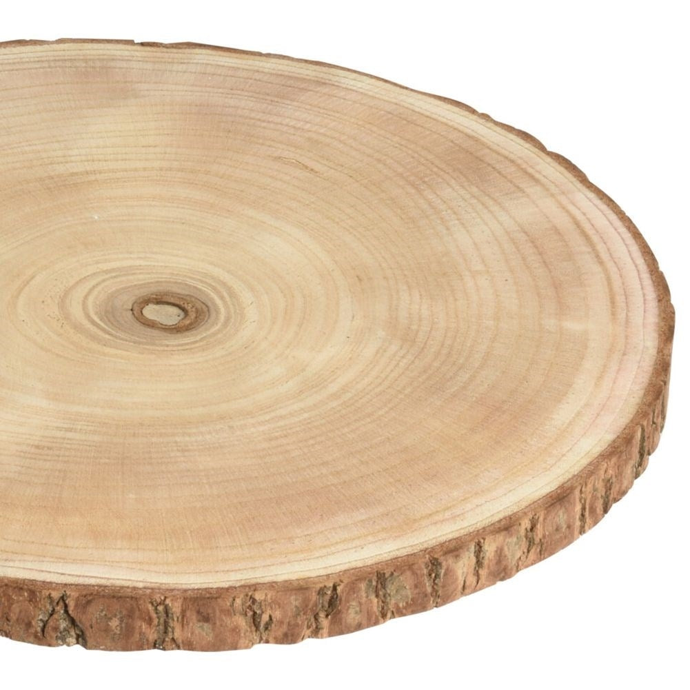 Decorative wooden board with bark for table settings and candles