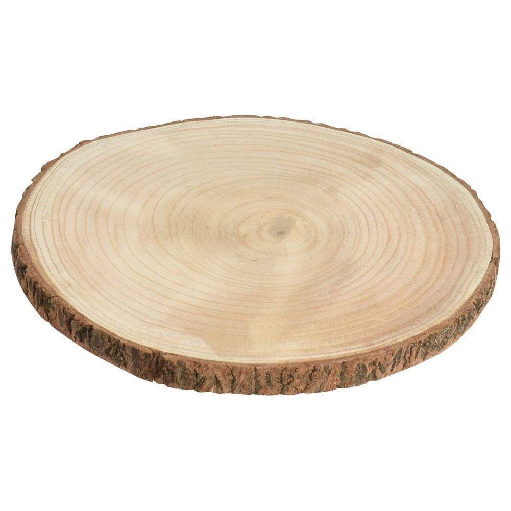 Decorative wooden board with bark for table settings and candles
