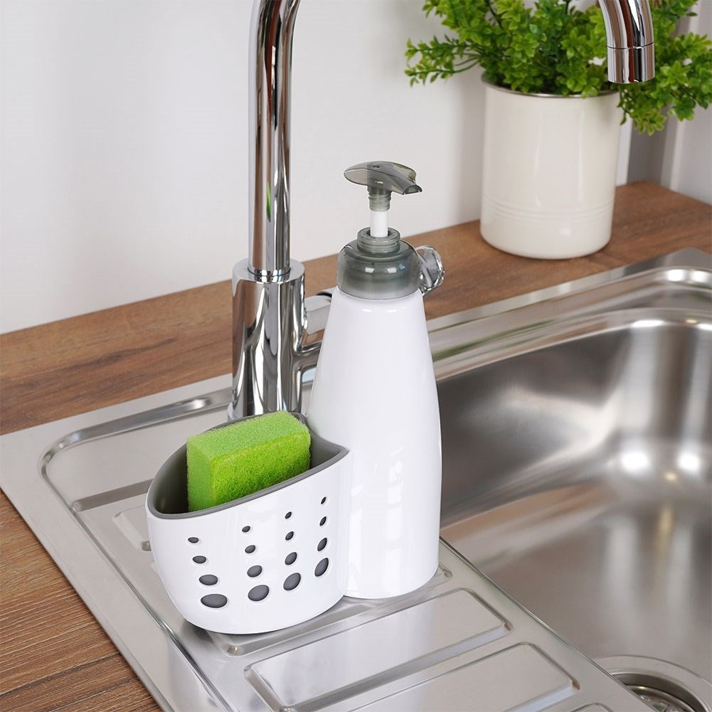 Detergent dispenser with pocket for cloth - practical solution