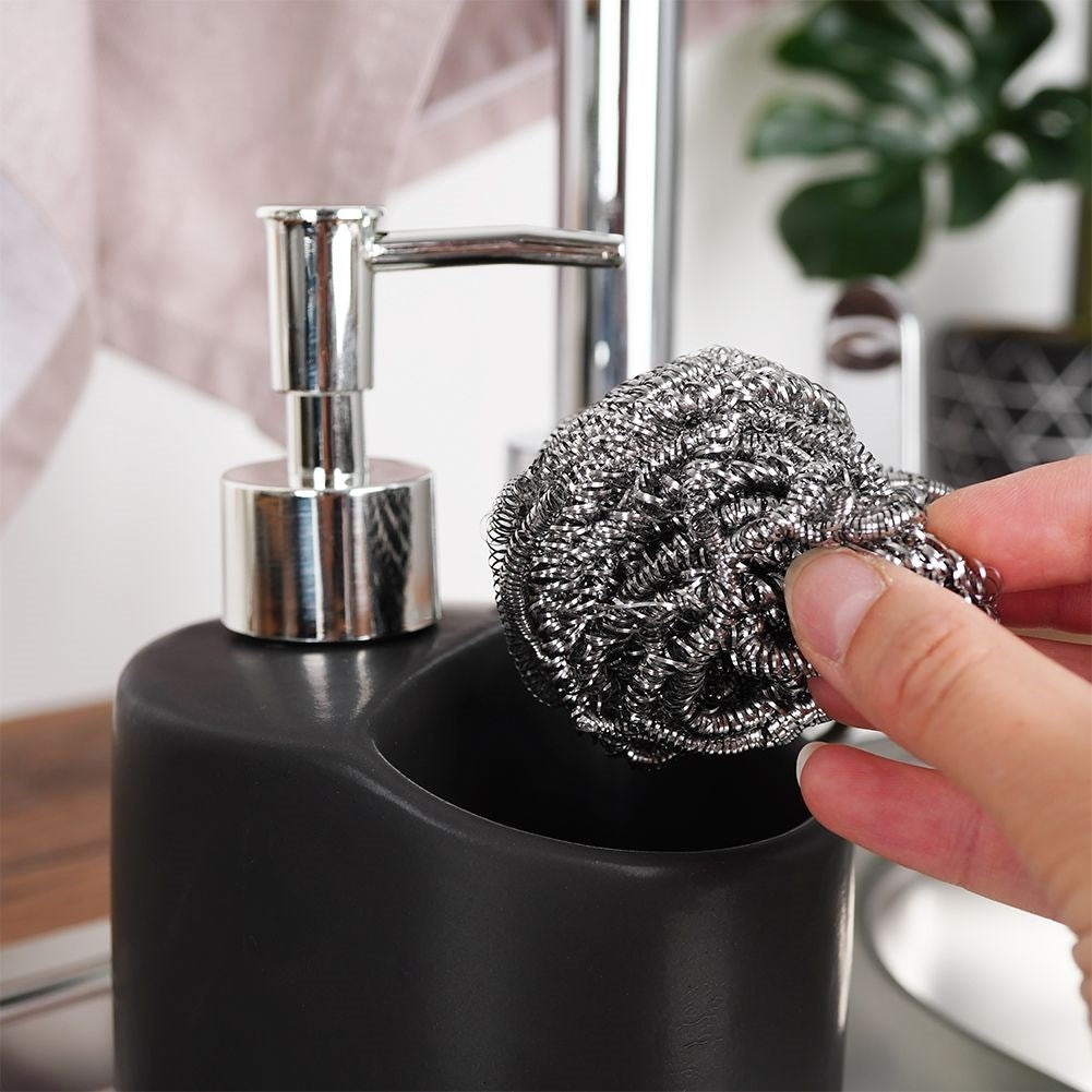 Detergent pump with sponge and storage space