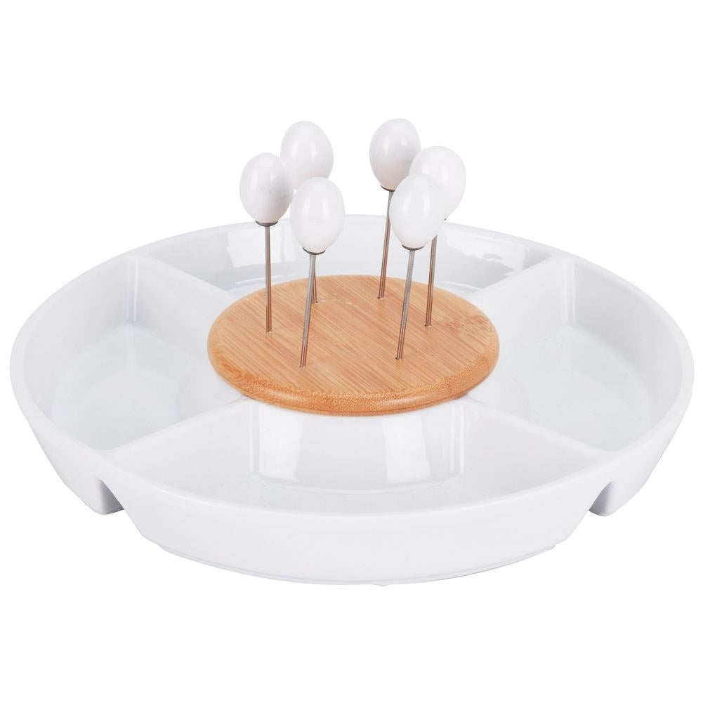 Divided porcelain bowl with steel toothpicks for snacks
