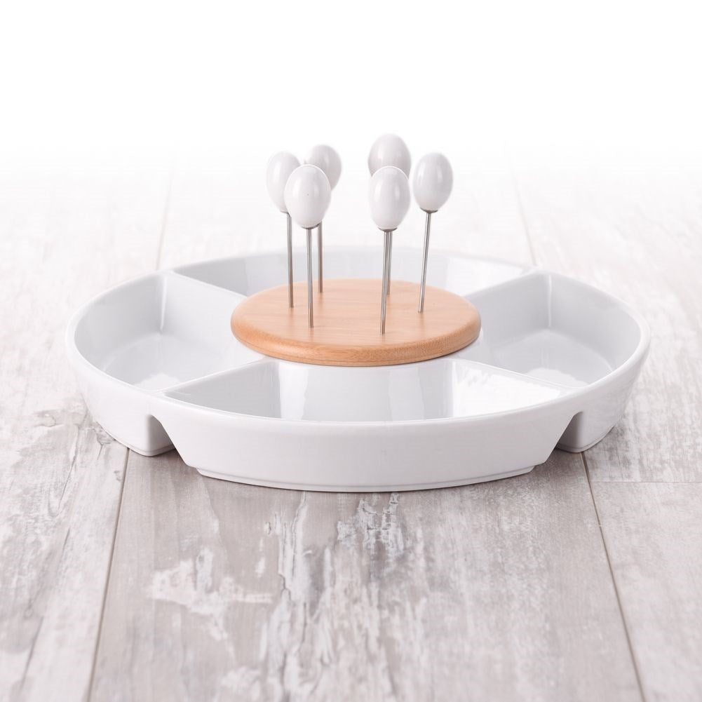 Divided porcelain bowl with steel toothpicks for snacks