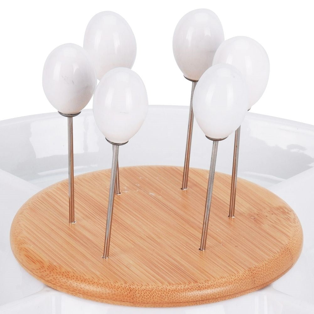 Divided porcelain bowl with steel toothpicks for snacks