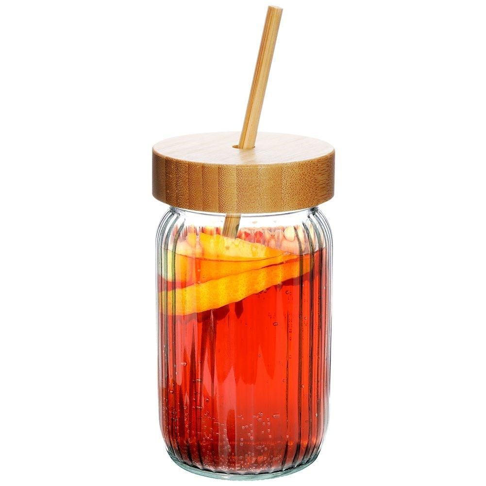 Drinking jar in thick glass with elegant stripes and bamboo straw