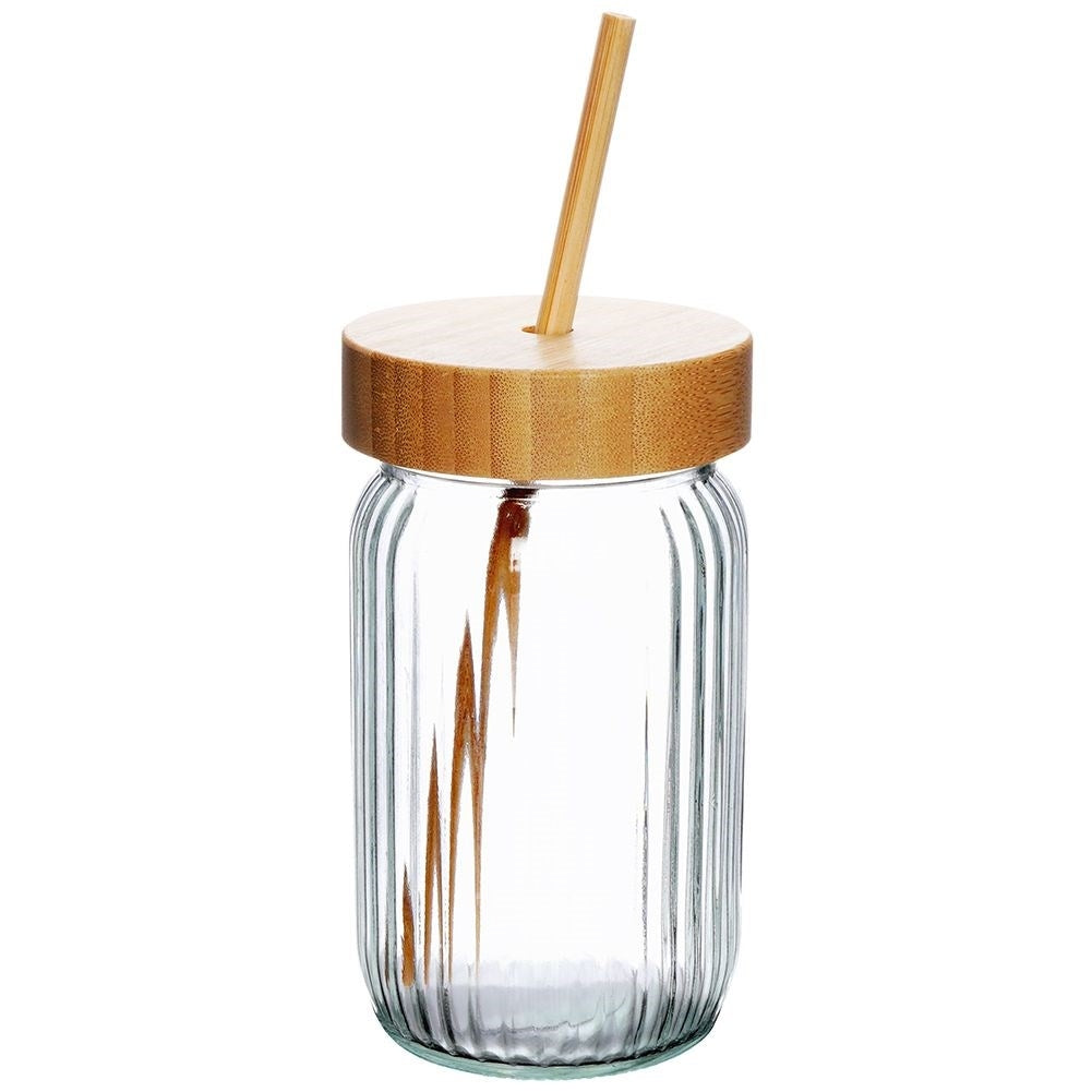 Drinking jar in thick glass with elegant stripes and bamboo straw