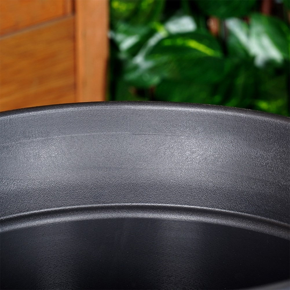 Durable black flower pot with stylish patterns for the patio