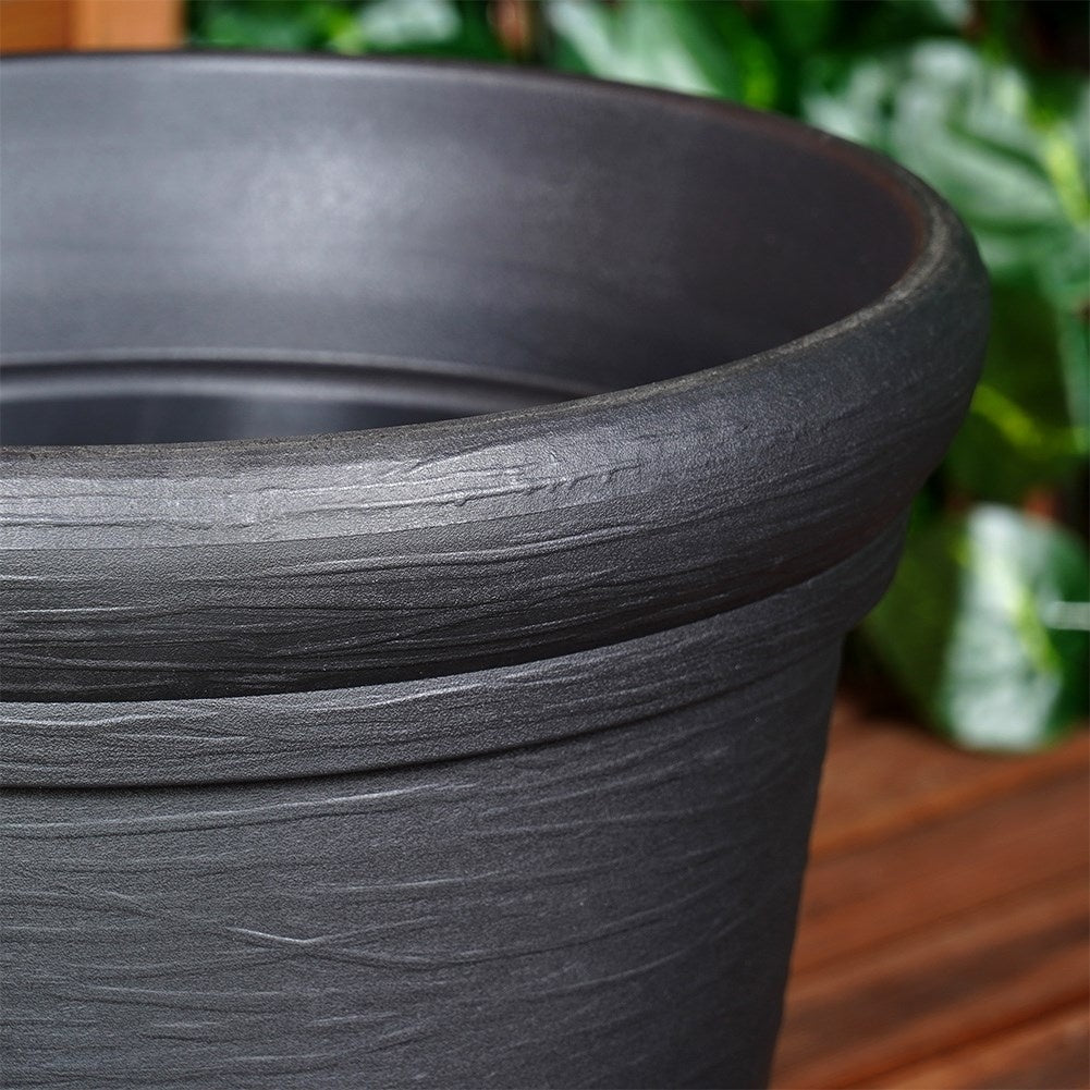 Durable black flower pot with stylish patterns for the patio