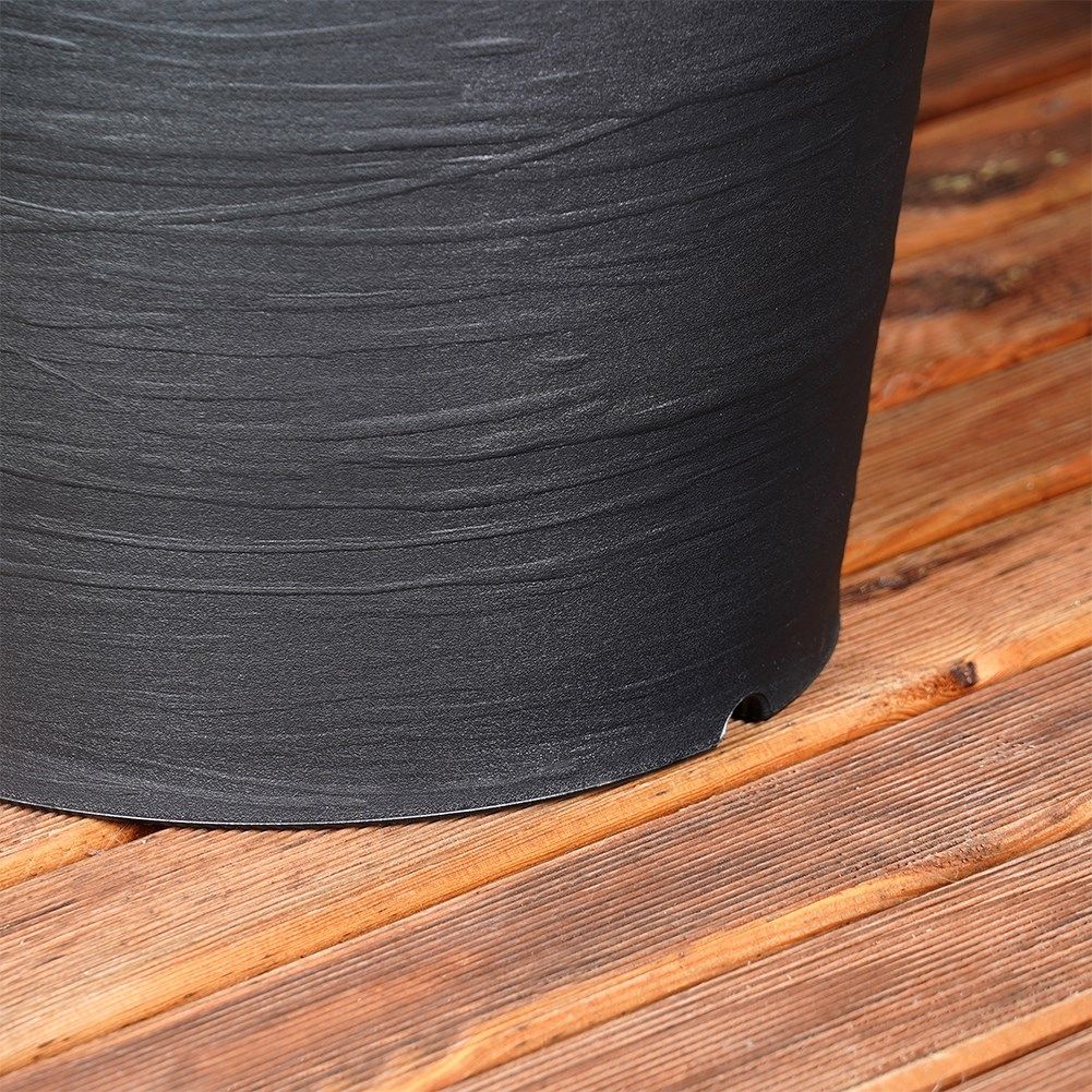 Durable black flower pot with stylish patterns for the patio