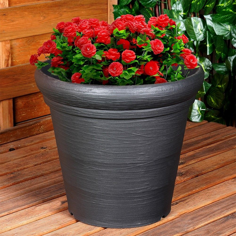 Durable black flower pot with stylish patterns for the patio