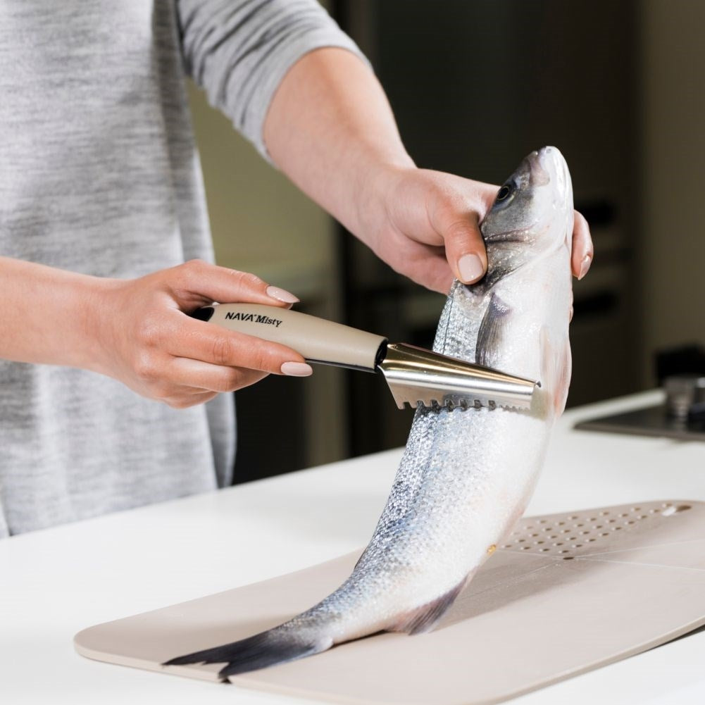 Effective fish scale scraper with comfortable handle and special blade
