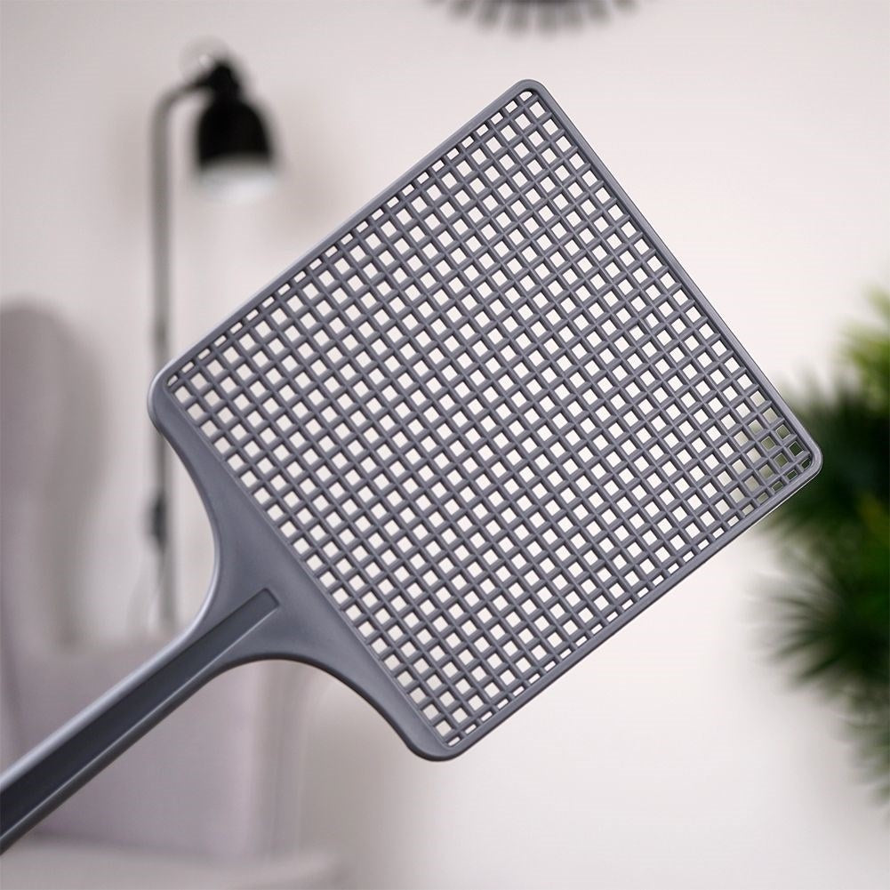 Effective fly swatter with non-slip grip and suspension.