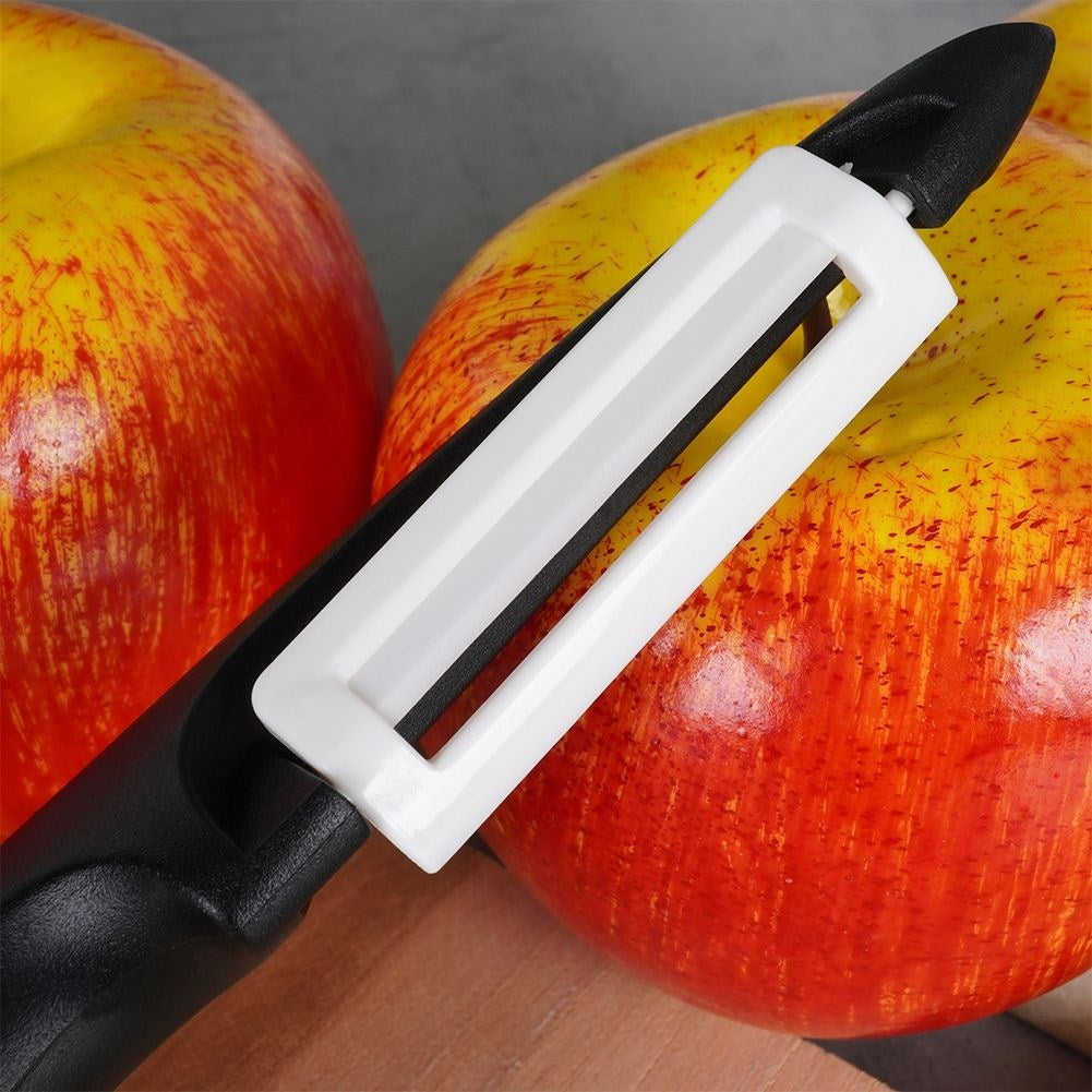 Effective kitchen tool with ceramic blade and comfortable handle
