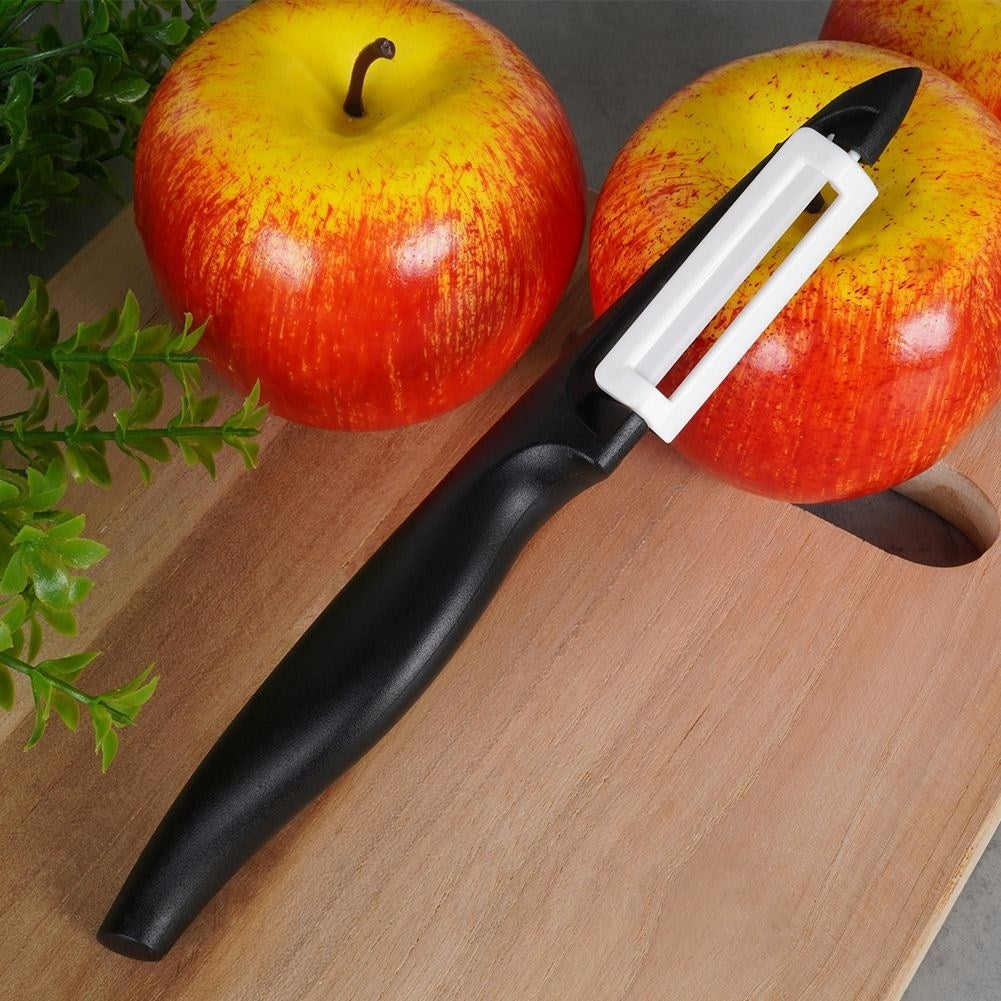Effective kitchen tool with ceramic blade and comfortable handle