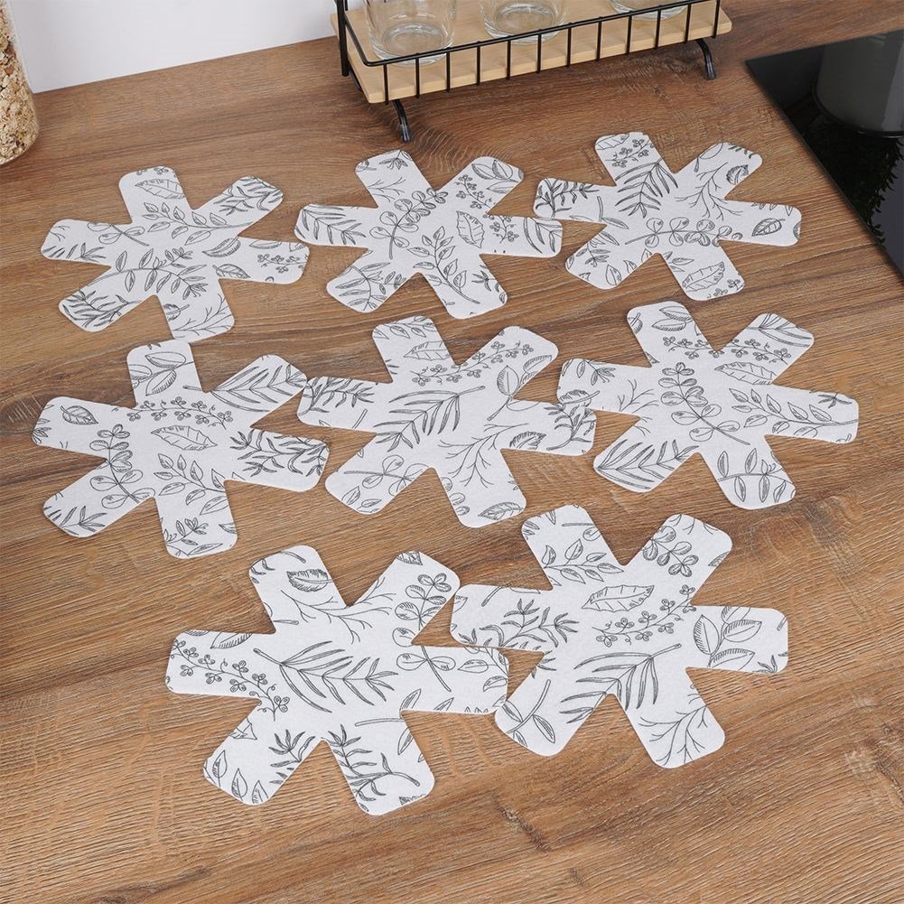 Eight protective felt pads for kitchen utensils