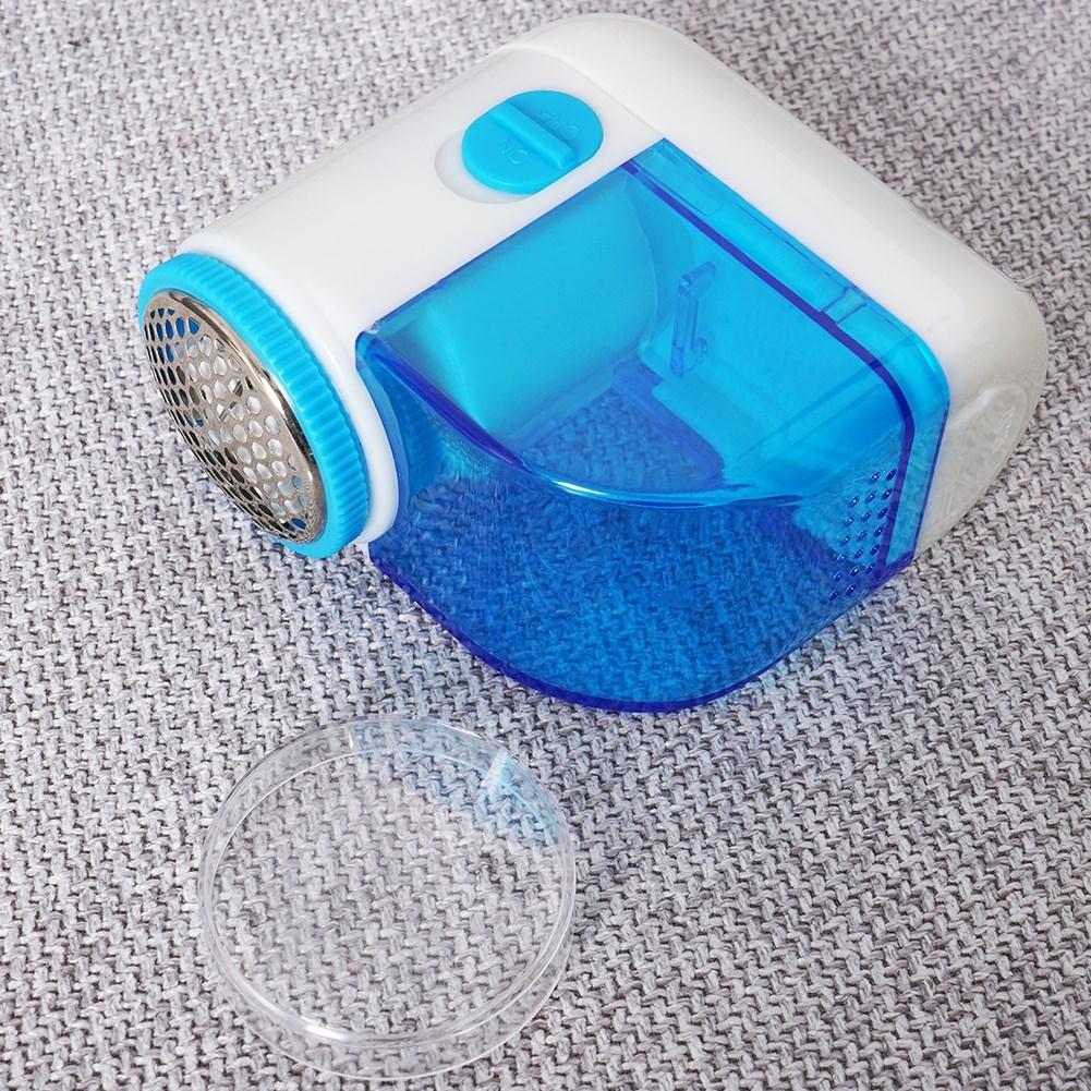 Electric burr remover with triple blade and brush