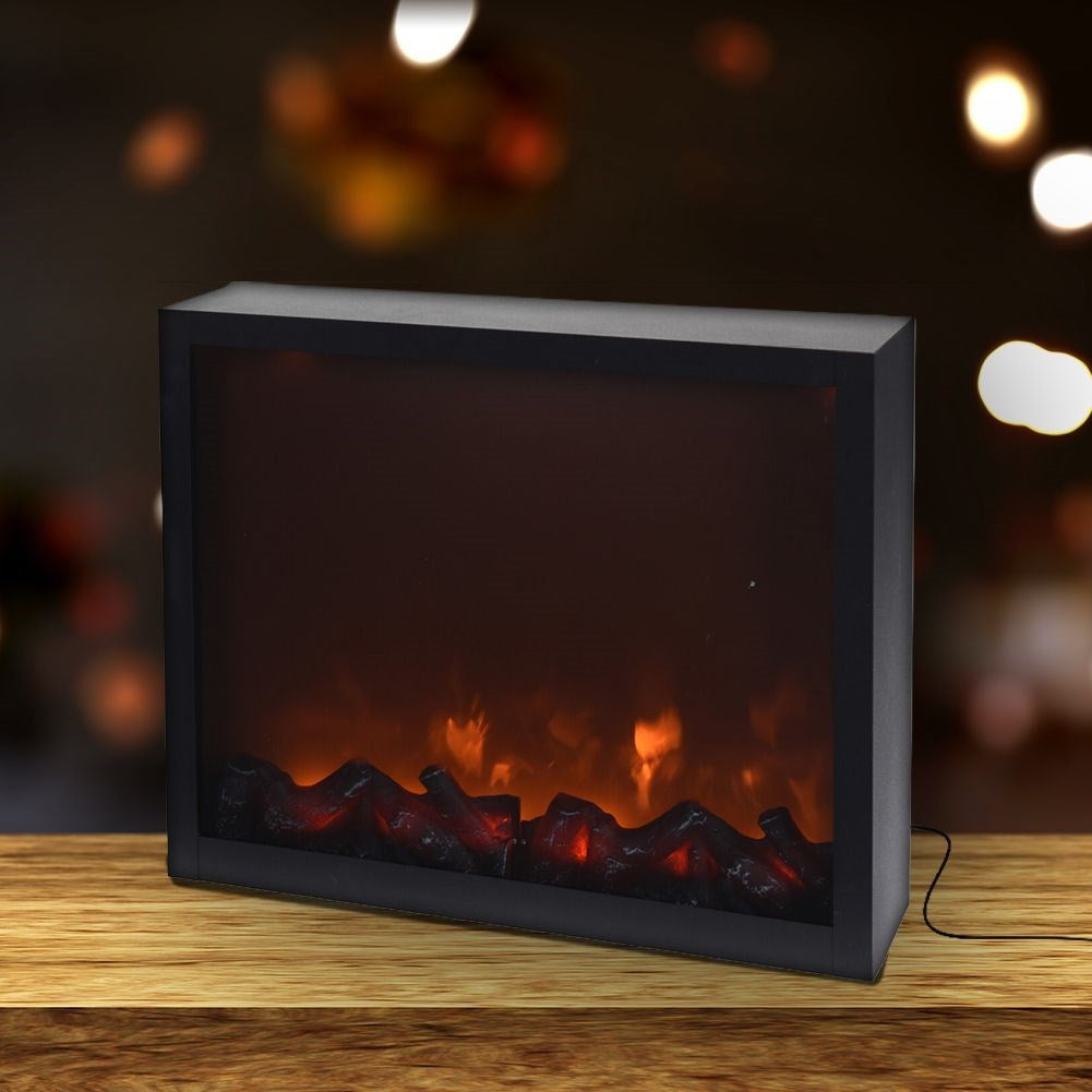Electric stove with LED, black metal and glass front.