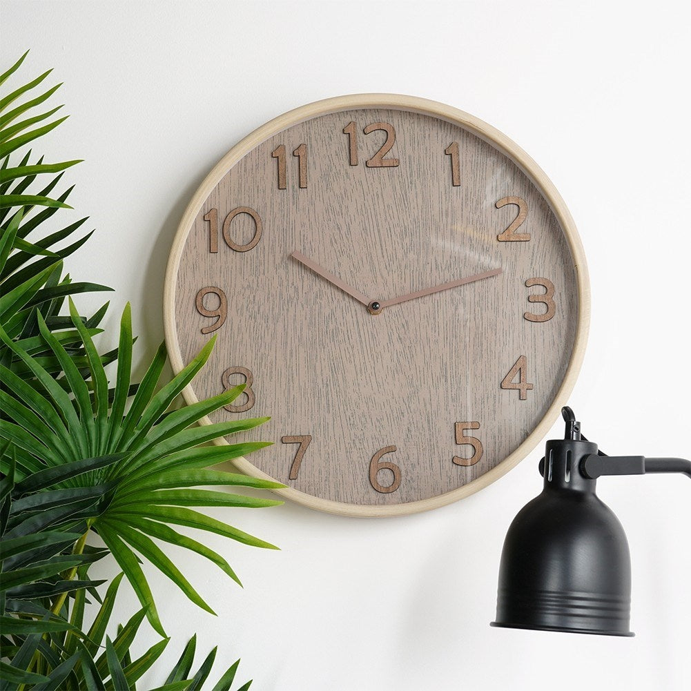 Elegant Wall Clock 38 cm with Wooden FinishThis wall clock has a diameter of 38 cm and is designed in a classic style. The frame of the watch is made of MDF, while the dial and hands have a wood-like finish. Perfect for giving your home a timeless and
