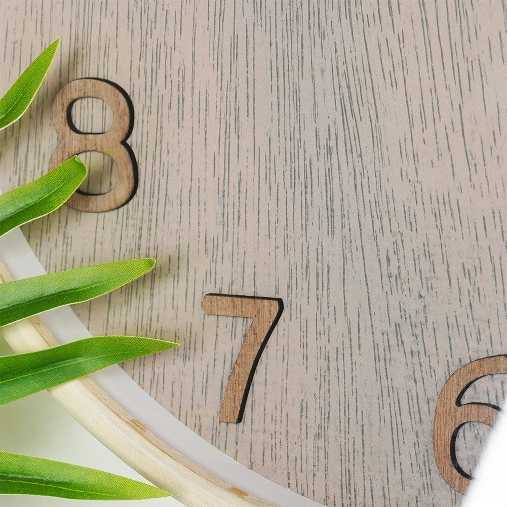 Elegant Wall Clock 38 cm with Wooden FinishThis wall clock has a diameter of 38 cm and is designed in a classic style. The frame of the watch is made of MDF, while the dial and hands have a wood-like finish. Perfect for giving your home a timeless and