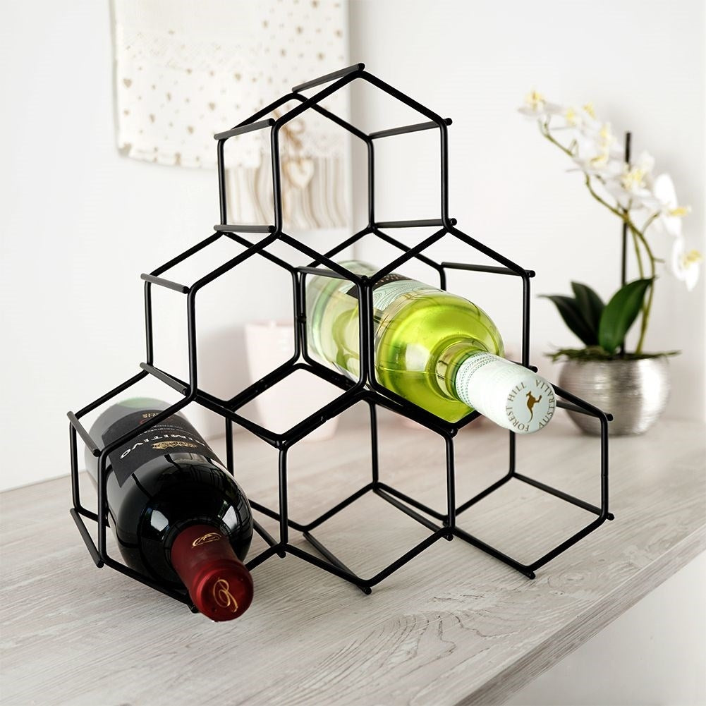 Elegant and stylish wine bottle in black metal for 6 bottles
