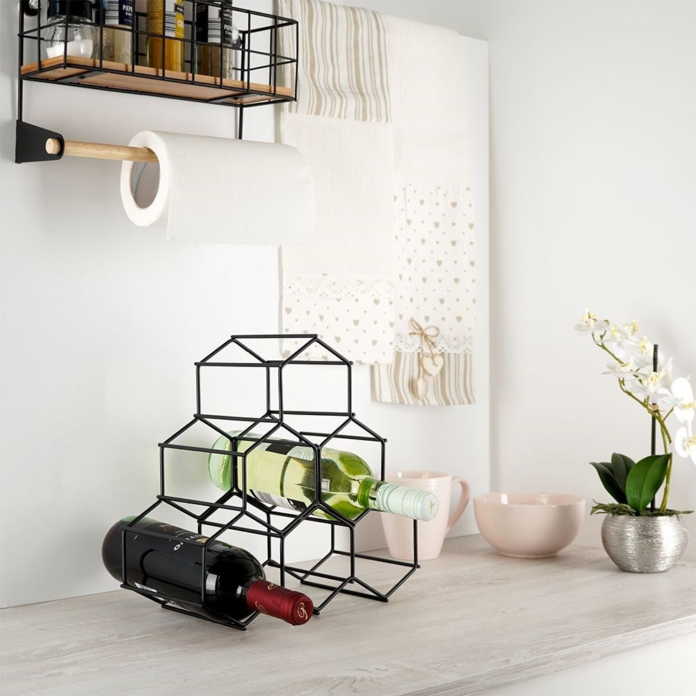 Elegant and stylish wine bottle in black metal for 6 bottles