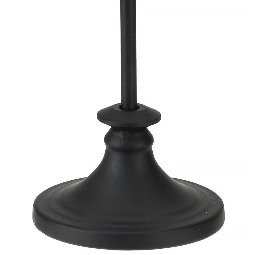 Elegant black candlestick in classic industrial style